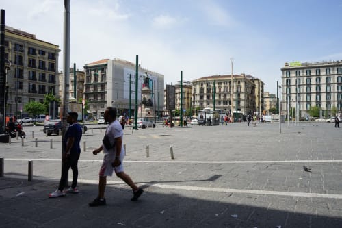 Piazza Garibaldi in Naples, Italy with historic buildings and city square view from Royal Rooms Station Napoli hotel
