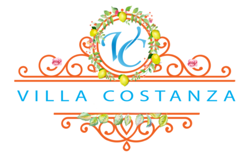 Logo Villa Costanza con design raffinato, limoni e iniziali blu - lussuoso B&B a Maiori, Costa d'Amalfi