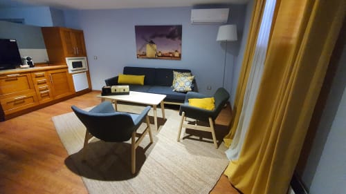 Zona de estar en vivienda de uso turístico Solano - Casa el Yelmo de Mambrino