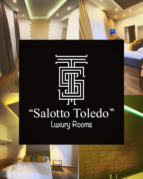 Camere di lusso Salotto Toledo a Napoli - camera da letto moderna con letto elegante, illuminazione ambientale e design contemporaneo