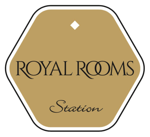 Royal Rooms Station logo - elegant gold hexagonal badge for Naples bed and breakfast hotel