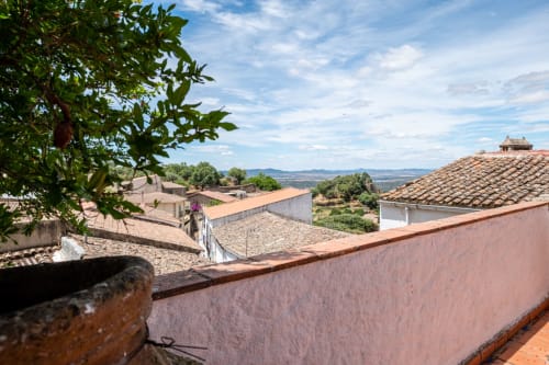 Terracotta roofed villa overlooking Montanchez countryside with valley views in Extremadura, Spain