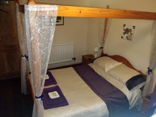 Potter Heigham, Four-poster bed, very comfortable. 