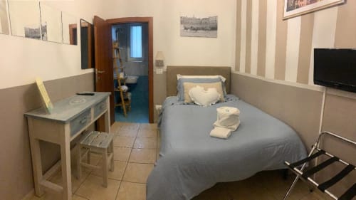 Camera Camelia, luminosa e arredata con cura nel cuore di Siena - B&B Le Camere di Livia.