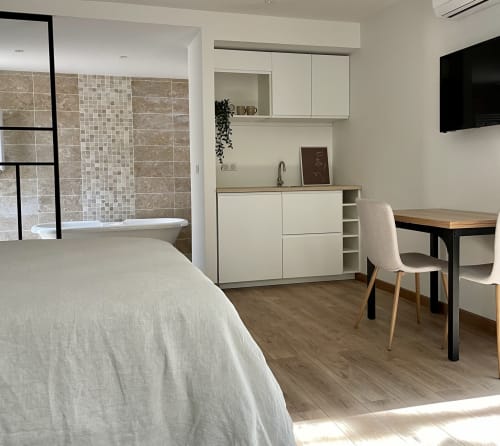 Living space with kitchenette and dining area