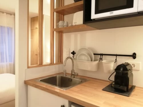 Espace cuisine de la chambre Chez Voltaire