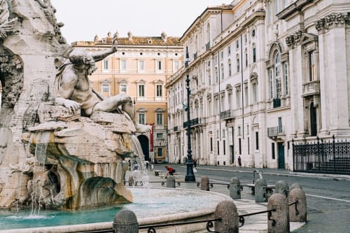Fountain in historic Rome piazza near AD Trastevere Guest House, classical architecture