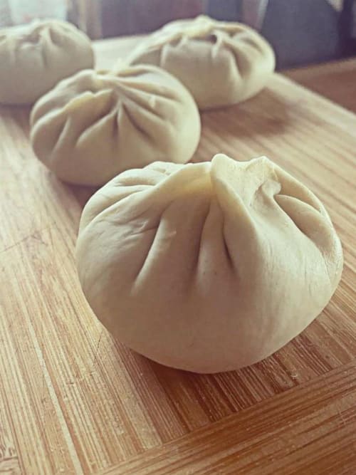 Freshly prepared steamed buns at La Guirtelle bed and breakfast in Lainsecq, France