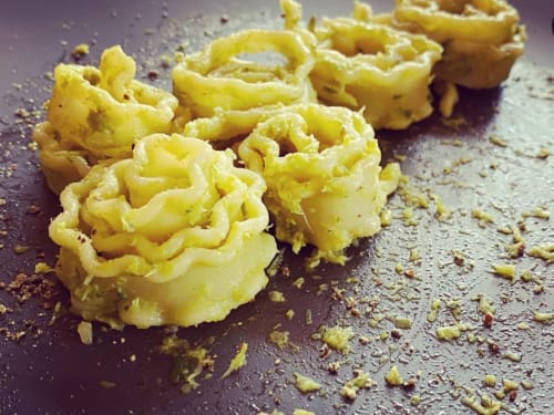 Yellow pistachio macarons dusted with crumbs at La Guirtelle B&B in Lainsecq, France
