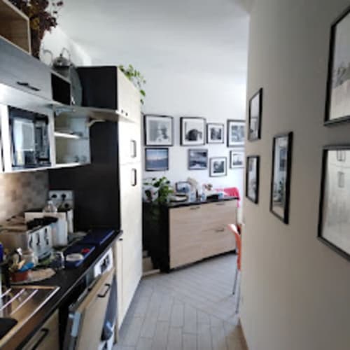 Kitchen and communal area of B&B Pontemare in Collemarino, Ancona, Marche.