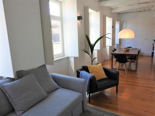 Apartment 1.3. Two-bedroom apartment with Sofa bed in livingroom. Suitable for 4 persons. Dining and seating area for 5 persons. HD Smart TV.  Located in historic center of Porto. At walking distance to most sceneries. Fully equipped kitchen with stove, oven, dishwasher, water cooker and Nespresso coffee machine (pads included). Cooling and heating by AC- Split unit.