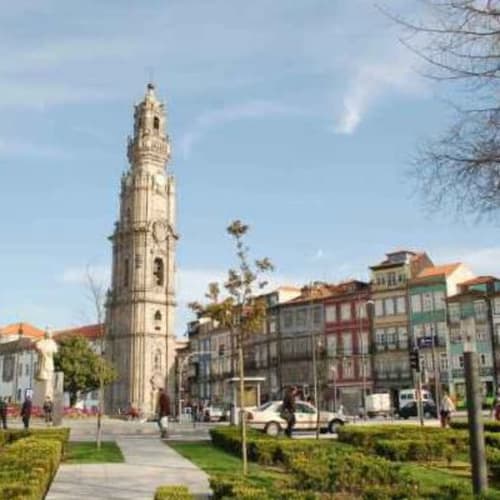 Clérigos Church, Porto: A Baroque Masterpiece
Located in Porto’s historic center, Clérigos Church (Igreja dos Clérigos) is a stunning 18th-century Baroque monument designed by Italian architect Nicolau Nasoni. Built between 1732 and 1750, its ornate granite facade features intricate carvings of garlands, shells, and scrolls—perfect for captivating website photos. The church’s unique elliptical nave, a first in Portugal, showcases marble altars and gilded woodwork, offering rich interior shots for your gallery.  
Adjacent to the church stands the iconic Clérigos Tower, a 75.6-meter bell tower completed in 1763. With 240 steps leading to a panoramic 360º view of Porto’s skyline and the Douro River, it’s a must-visit landmark and a prime photo opportunity. The tower’s granite structure and Baroque details dominate the cityscape, making it an instantly recognizable symbol of Porto—ideal for boosting your site’s visual appeal and SEO with keywords like “Clérigos Tower Porto” or “Porto historic landmarks.”  

