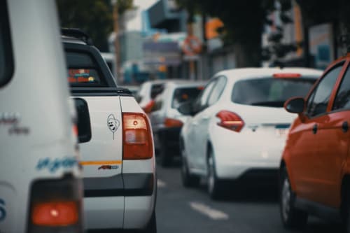 Parked cars in Rome street, near Orso Luxury Apartments hotel location