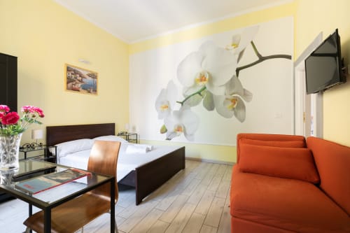 Scala Garden intero appartamento| Per 12 persone con cinque camere da letto, quattro bagni, cucina moderna, soggiorno e bellissimo giardino con patio - Scala Garden Apartments nel centro di Firenze, Toscana.