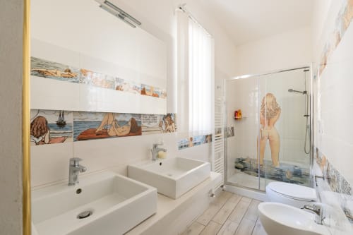 Scala Garden intero appartamento| Per 12 persone con cinque camere da letto, quattro bagni, cucina moderna, soggiorno e bellissimo giardino con patio - Scala Garden Apartments nel centro di Firenze, Toscana.