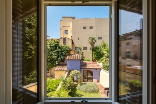 Scala Garden intero appartamento| Per 12 persone con cinque camere da letto, quattro bagni, cucina moderna, soggiorno e bellissimo giardino con patio - Scala Garden Apartments nel centro di Firenze, Toscana.