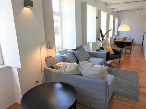 Apartment 1.3. Two-bedroom apartment with Sofa bed in livingroom. Suitable for 4 persons. Dining and seating area for 5 persons. HD Smart TV.  Located in historic center of Porto. At walking distance to most sceneries. Fully equipped kitchen with stove, oven, dishwasher, water cooker and Nespresso coffee machine (pads included). Cooling and heating by AC- Split unit.