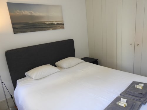 Apartment 1.3. Two-bedroom apartment with Sofa bed in livingroom. Suitable for 4 persons. Dining and seating area for 5 persons. HD Smart TV.  Located in historic center of Porto. At walking distance to most sceneries. Fully equipped kitchen with stove, oven, dishwasher, water cooker and Nespresso coffee machine (pads included). Cooling and heating by AC- Split unit.