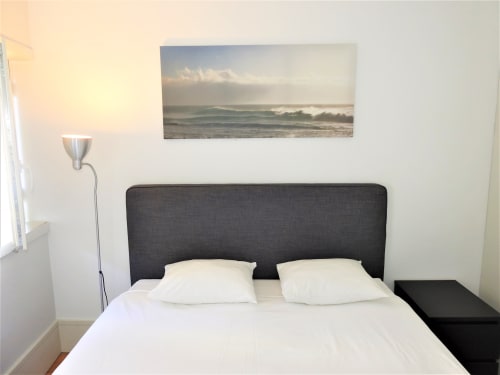 Apartment 1.3. Two-bedroom apartment with Sofa bed in livingroom. Suitable for 4 persons. Dining and seating area for 5 persons. HD Smart TV.  Located in historic center of Porto. At walking distance to most sceneries. Fully equipped kitchen with stove, oven, dishwasher, water cooker and Nespresso coffee machine (pads included). Cooling and heating by AC- Split unit.