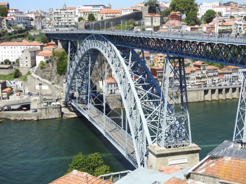 The Dom Luís I Bridge, or Luís I Bridge, is a double-deck metal arch bridge that spans the River Douro between the cities of Porto and Vila Nova de Gaia in Portugal. At its construction, its 172 metres span was the longest of its type in the world.