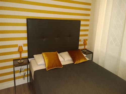 Camera matrimoniale Gold con aria condizionata, TV e Wi-Fi- Bagno privato con asciugamani e asciugacapelli - Il Cavaliere B&B nel quartiere Aurelio, vicino al centro di Roma.