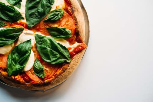 Margherita pizza with fresh basil at Museo19, a boutique B&B in Naples, Italy