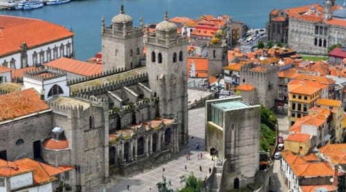 The Cathedral of Porto, also known as the Sé do Porto, is a Roman Catholic cathedral located in the historic center of Porto, Portugal. It is the oldest church in the city and one of the oldest in the country.

The cathedral was built in the 12th century in the Romanesque style and features a distinctive rose window and Gothic-style cloisters. The interior of the cathedral is decorated with beautiful stained glass windows, marble altars, and intricate stone carvings.

The cathedral is also home to several important historical artifacts, including a 12th-century Gothic processional cross and a 13th-century Gothic statue of the Virgin Mary.

Despite its age, the cathedral is still an active place of worship and is a popular destination for both tourists and locals alike. It is also a UNESCO World Heritage Site.