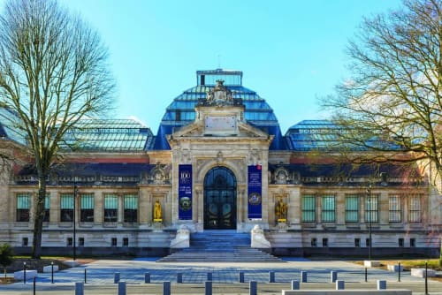 Historic building facade with blue dome roof in Valenciennes, France - Le Grand Duc entrance