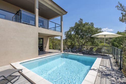 Swimming pool area sun loungers rental villa Porticcio