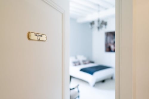 Magnum 1.5 room door at Pavillon Des Millesimes & SPA luxury bed and breakfast in Lussac