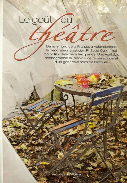 Rustic autumn table setting at Le Grand Duc B&B in Valenciennes, France, with fallen leaves and colorful cocktails