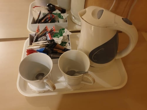 Hospitality tea and coffee station at The Sands Hotel Paignton with kettle, mugs, and refreshment supplies