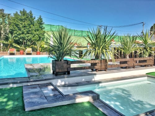View of the main private swimming pool of the F&C holiday accommodation