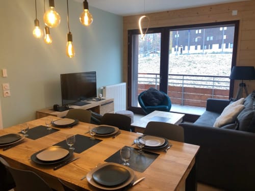 location vacances la plagne, repas, salon