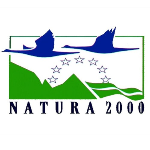 Natura 2000 logo with flying birds and European stars representing protected natural area conservation