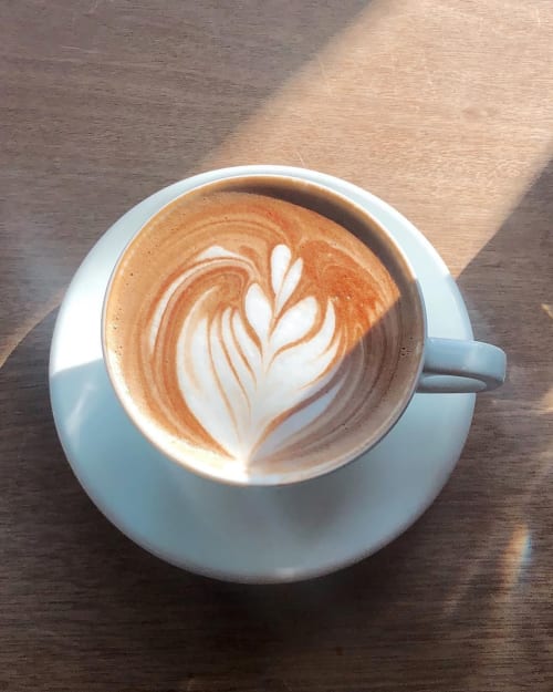 Latte with latte art at Museo19 bed and breakfast in Naples, Italy