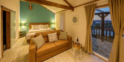 Bungalows inside at night Olive Hill Guesthouse in Batalha, Portugal.