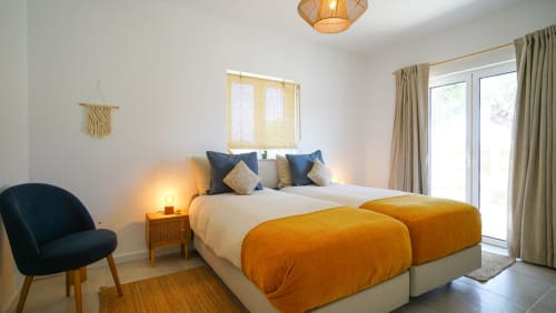 Roller room | Birds of Paradise - Unique, bright and beautiful en-suite bathroom, comfy twin bed, a chair, a closet with hangers, shelves and a private terrace in the garden