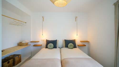 Sanderling room | Birds of Paradise - Unique, bright and beautiful, en-suite bathroom, comfy twin bed, a work desk and chair, a closet with hangers, shelves and a private balcony overlooking the swimming pool