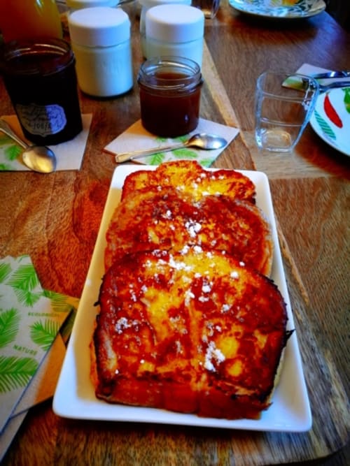 French toast with powdered sugar served at Aux Prés Du Berry bed and breakfast in Chavin