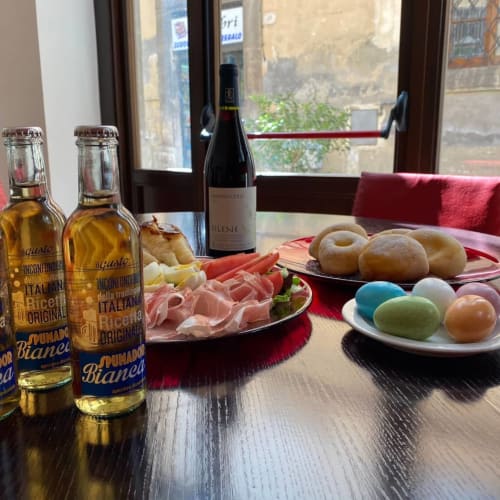 Italian welcome spread at Stella CasaBono in Sulmona with wine, cured meats, pastries and macarons