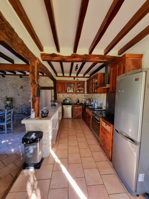 Fully equipped kitchen open to the living room 