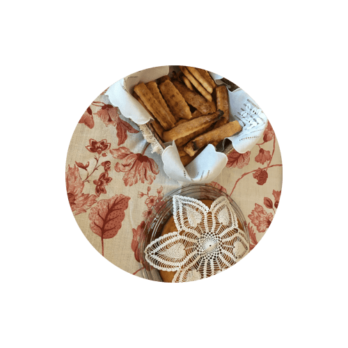 Homemade biscuits and crochet doily at Casa das Jardas rural B&B in Ladoeiro, Portugal