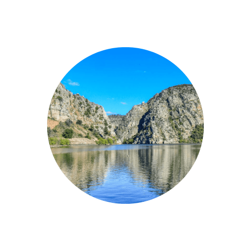 Scenic river canyon with towering limestone cliffs near Casa das Jardas, Ladoeiro Portugal
