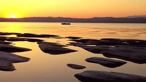 Mavino Holidays | Tramonto a Sirmione.