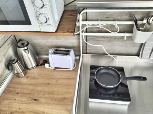 Image of the kitchen of Mini studio el Reloj