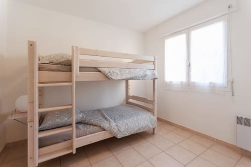 Lit superposé de la deuxième chambre de l'appartement Le Mérou - Vacances Giens location saisonnière d'appartement - Proche du stade Raymond Degioanni