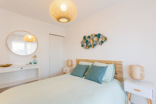 Lit double de l'appartement La Rascasse - Vacances Giens location saisonnière d'appartement - Proche de la plage de La Badine.
