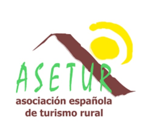 Logo ASETUR - Emblema de la asociación española de turismo rural con diseño de montaña y sol