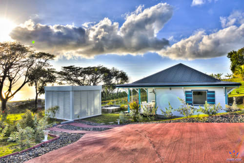 Kaz'Samana cottage at Le Domaine De L'ilet in Saint-Claude, Guadeloupe, with sea view and landscaped garden